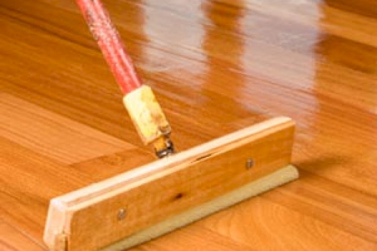 Polishing wooden floors.